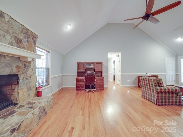 4620 Binwhe Ln, Gastonia, NC 28052 - office space with a ceiling fan, light wood-style floors, lofted ceiling, a fireplace, and baseboards