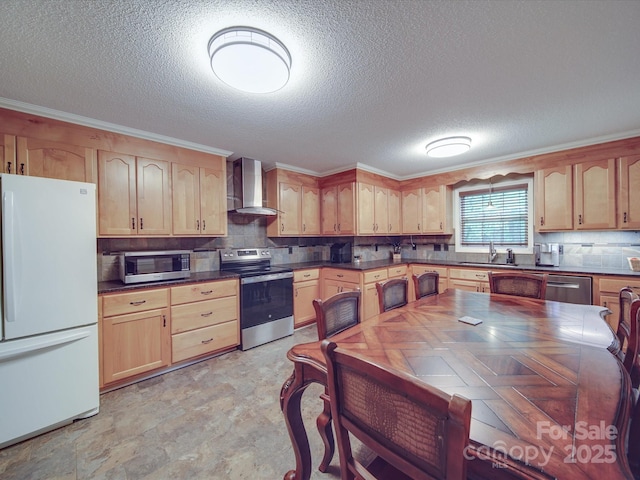 4620 Binwhe Ln, Gastonia, NC 28052 - kitchen featuring stainless steel appliances, wall chimney exhaust hood, light brown cabinetry, a textured ceiling, and ornamental molding