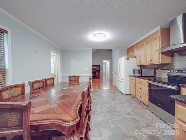 4620 Binwhe Ln, Gastonia, NC 28052 - kitchen with wall chimney range hood, appliances with stainless steel finishes, light brown cabinetry, ornamental molding, and dark countertops