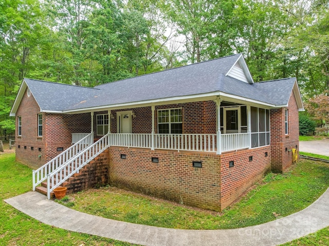4620 Binwhe Ln, Gastonia, NC 28052 - single story home with crawl space, a shingled roof, brick siding, a front lawn, and covered porch