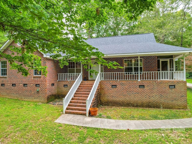 4620 Binwhe Ln, Gastonia, NC 28052 - bungalow-style house featuring crawl space, a front lawn, brick siding, covered porch, and roof with shingles