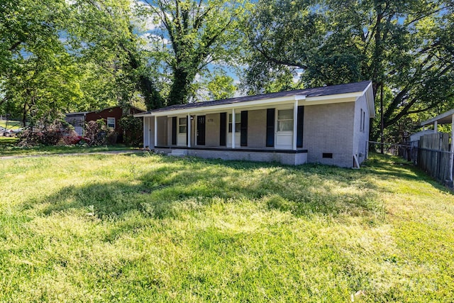 view of front of property featuring a porch, brick siding, and crawl space