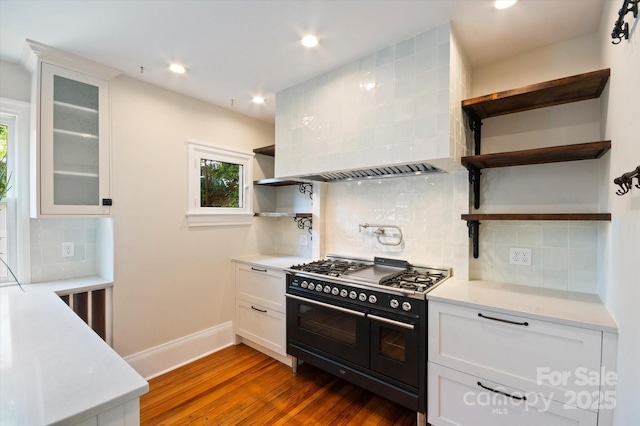 31 Jefferson Dr, Asheville, NC 28801 - kitchen featuring open shelves, double oven range, wood finished floors, baseboards, and light countertops