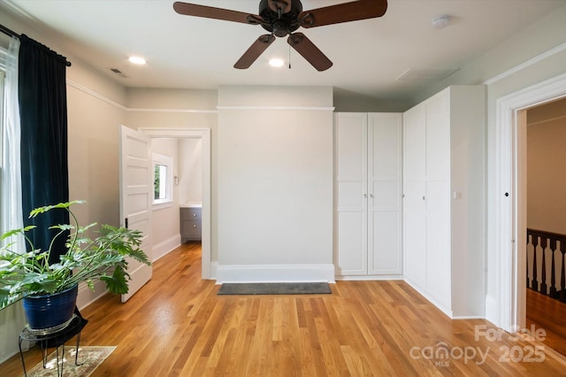 31 Jefferson Dr, Asheville, NC 28801 - unfurnished bedroom featuring light wood finished floors, baseboards, and ceiling fan