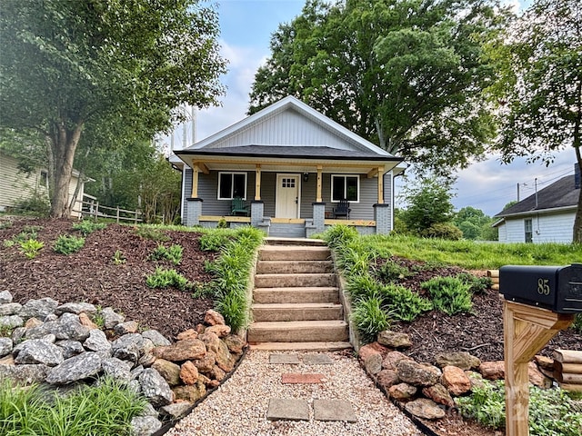 85 Archer St, Granite Falls, NC 28630 - view of front of house featuring covered porch, board and batten siding, and stairs