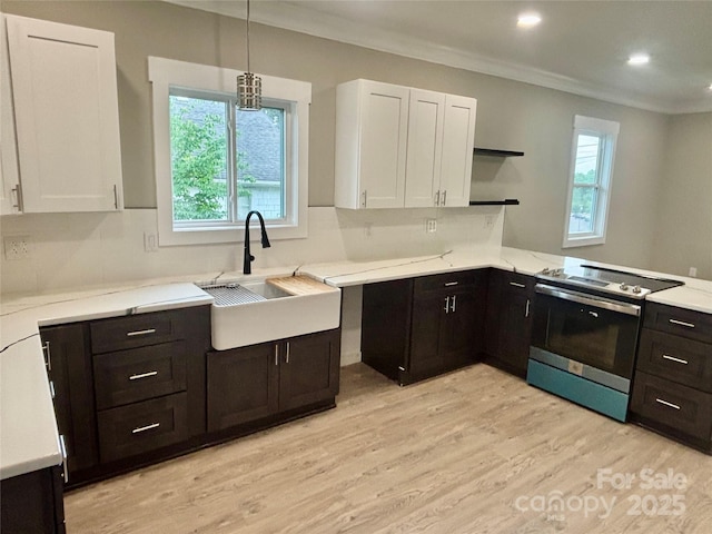 85 Archer St, Granite Falls, NC 28630 - kitchen featuring stainless steel electric stove, open shelves, white cabinetry, a sink, and ornamental molding