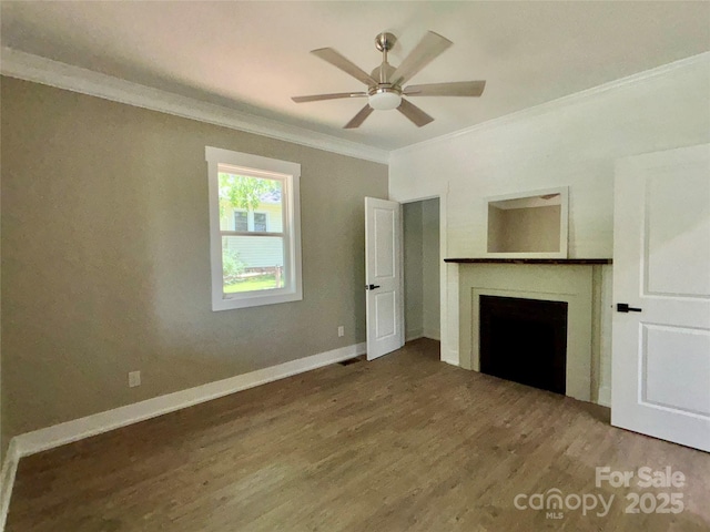 85 Archer St, Granite Falls, NC 28630 - unfurnished living room featuring crown molding, wood finished floors, a fireplace, a ceiling fan, and baseboards