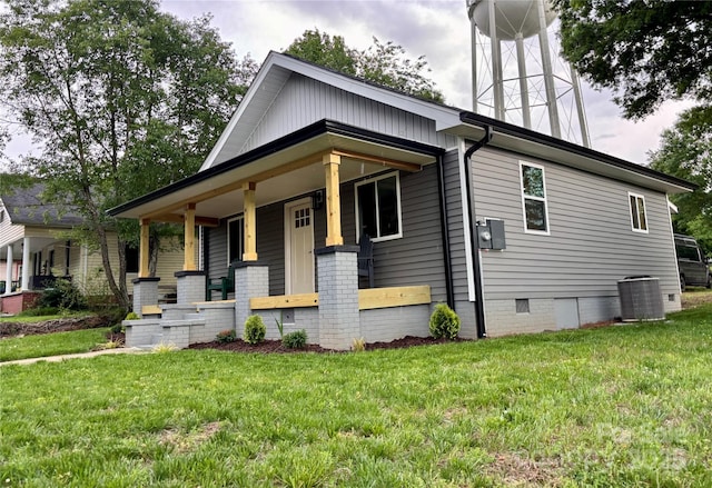 85 Archer St, Granite Falls, NC 28630 - view of front of home featuring covered porch, crawl space, a front lawn, and central AC