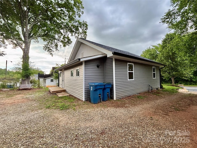 85 Archer St, Granite Falls, NC 28630 - view of side of home with a wooden deck and roof with shingles