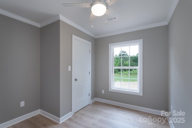 251 Hall Spencer Rd, Catawba, SC 29704 - unfurnished room featuring light wood-type flooring, crown molding, ceiling fan, and baseboards