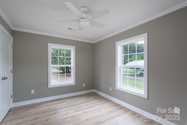 251 Hall Spencer Rd, Catawba, SC 29704 - spare room featuring plenty of natural light, ornamental molding, light wood-type flooring, and a ceiling fan