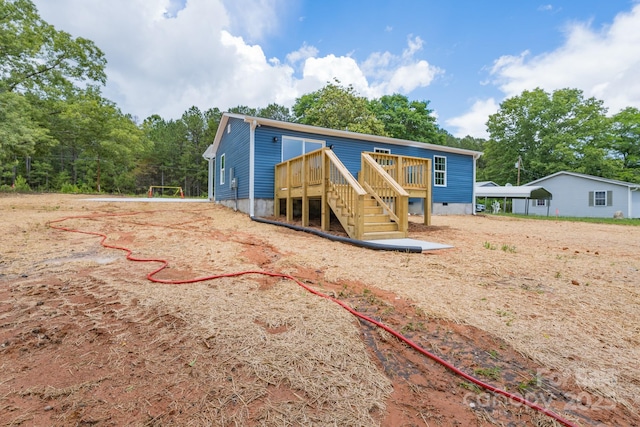 251 Hall Spencer Rd, Catawba, SC 29704 - rear view of house featuring a wooden deck and stairs