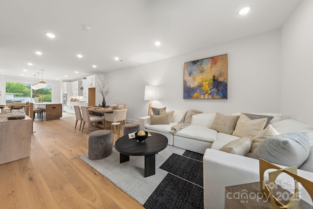 158 Mattoon St, Charlotte, NC 28216 - living area with light wood-type flooring and recessed lighting