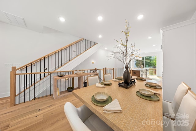 158 Mattoon St, Charlotte, NC 28216 - dining area with wood finished floors, recessed lighting, and stairs