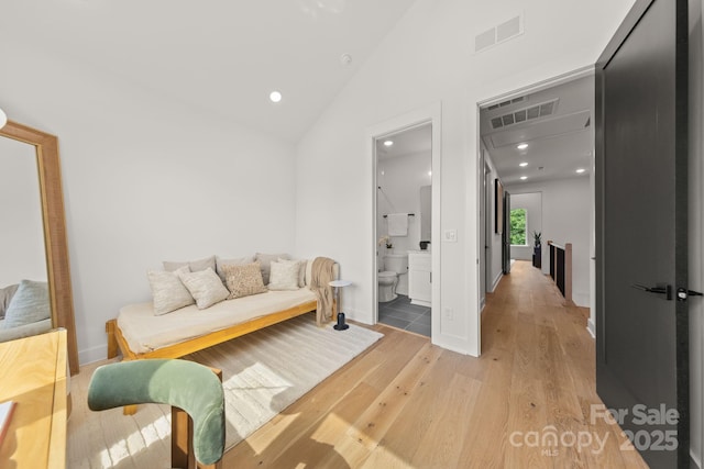 158 Mattoon St, Charlotte, NC 28216 - living room with light wood-style floors, recessed lighting, high vaulted ceiling, and baseboards