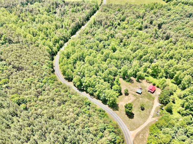 drone / aerial view of a heavily wooded area