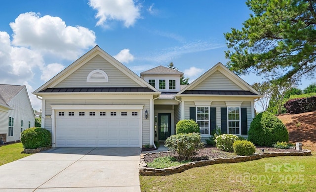 43041 Mimosa Ct, Fort Mill, SC 29707 - view of front of home with a standing seam roof, concrete driveway, a garage, a front lawn, and metal roof