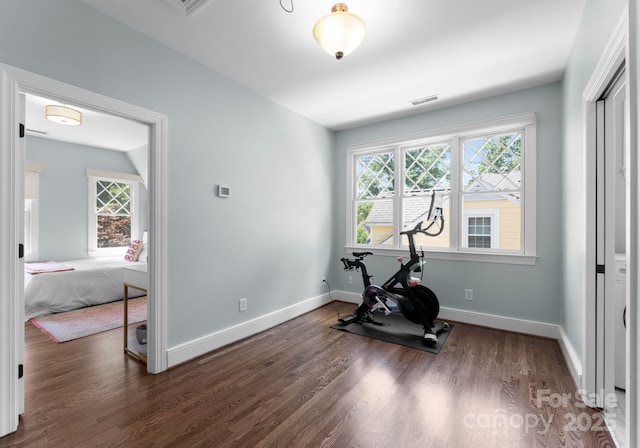 236 Wales Ave, Charlotte, NC 28209 - workout room featuring baseboards and wood finished floors