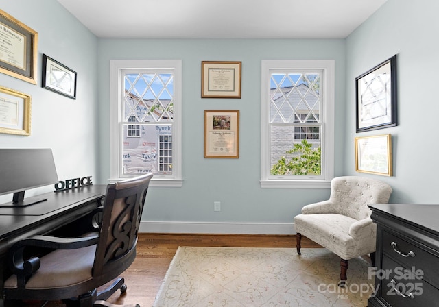 236 Wales Ave, Charlotte, NC 28209 - home office with wood finished floors, plenty of natural light, and baseboards