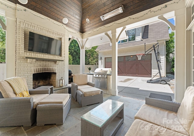 236 Wales Ave, Charlotte, NC 28209 - view of patio with an outdoor living space with a fireplace, a grill, driveway, and an attached garage