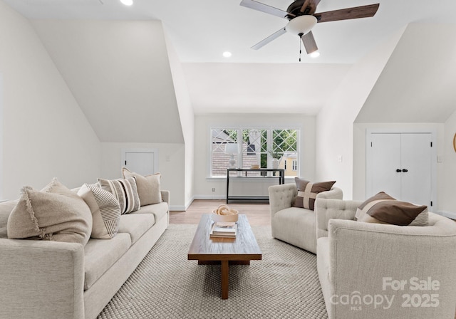236 Wales Ave, Charlotte, NC 28209 - living area featuring light wood finished floors, lofted ceiling, ceiling fan, baseboards, and recessed lighting
