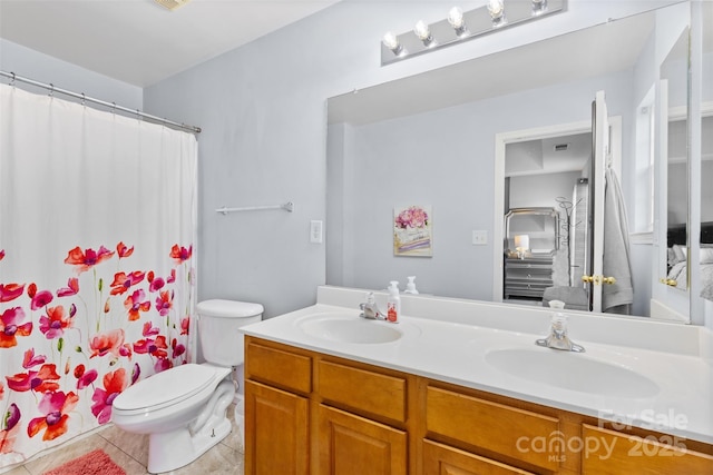 9775 Mallard Glen Dr, Charlotte, NC 28262 - bathroom with double vanity, toilet, tile patterned floors, and curtained shower
