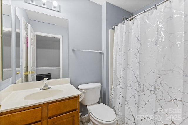 9775 Mallard Glen Dr, Charlotte, NC 28262 - full bathroom featuring vanity, toilet, and a shower with shower curtain