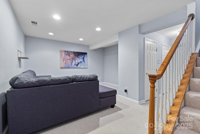 9775 Mallard Glen Dr, Charlotte, NC 28262 - living room featuring light colored carpet, recessed lighting, stairway, and baseboards