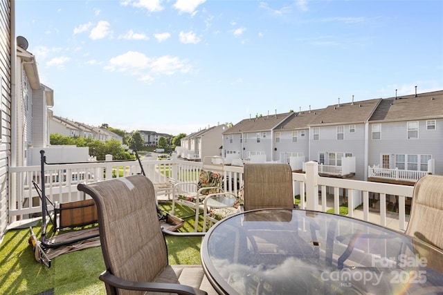9775 Mallard Glen Dr, Charlotte, NC 28262 - wooden deck with a residential view and outdoor dining area