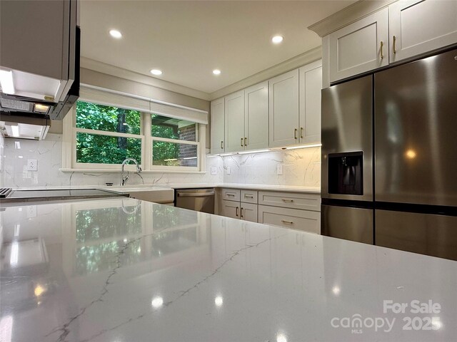 456 Brook Valley Ct NE, Concord, NC 28025 - kitchen with appliances with stainless steel finishes, a sink, decorative backsplash, light stone countertops, and recessed lighting