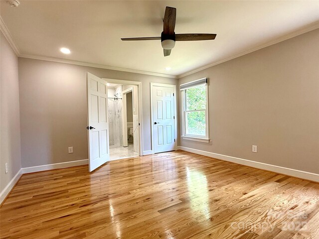 456 Brook Valley Ct NE, Concord, NC 28025 - unfurnished bedroom featuring light wood finished floors, baseboards, crown molding, recessed lighting, and ensuite bathroom