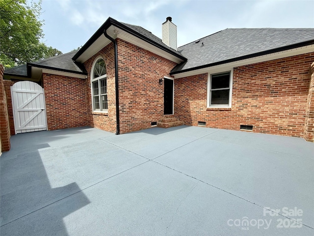 456 Brook Valley Ct NE, Concord, NC 28025 - back of property featuring entry steps, crawl space, a chimney, roof with shingles, and brick siding