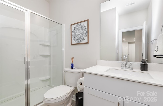 941 Rachel Anne Dr, Belmont, NC 28012 - bathroom featuring a shower stall, toilet, and vanity