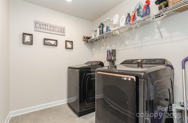 941 Rachel Anne Dr, Belmont, NC 28012 - washroom featuring separate washer and dryer, baseboards, and light tile patterned floors