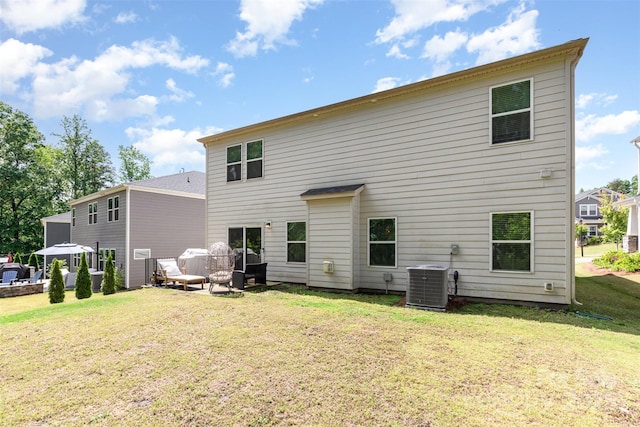 941 Rachel Anne Dr, Belmont, NC 28012 - back of property with central AC and a lawn