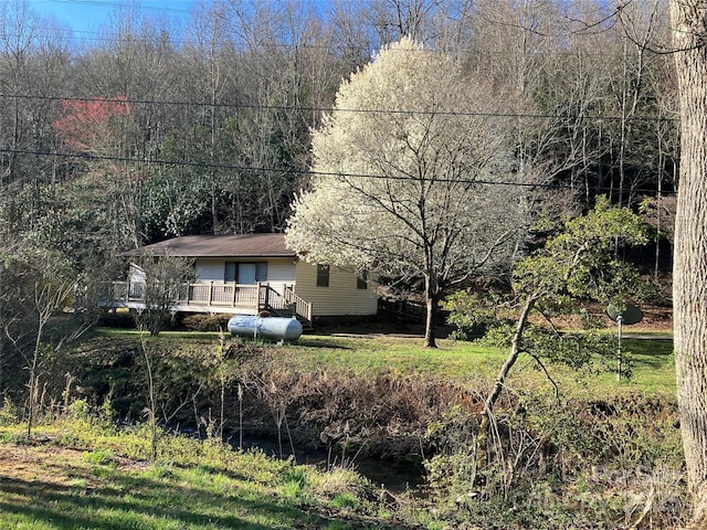 45 Old Cove Rd, Sylva, NC 28779 - view of front of property featuring a wooden deck and a wooded view