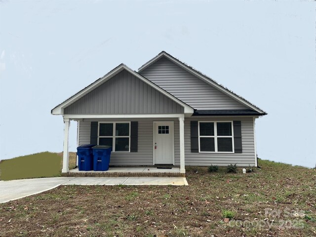 bungalow-style home with covered porch