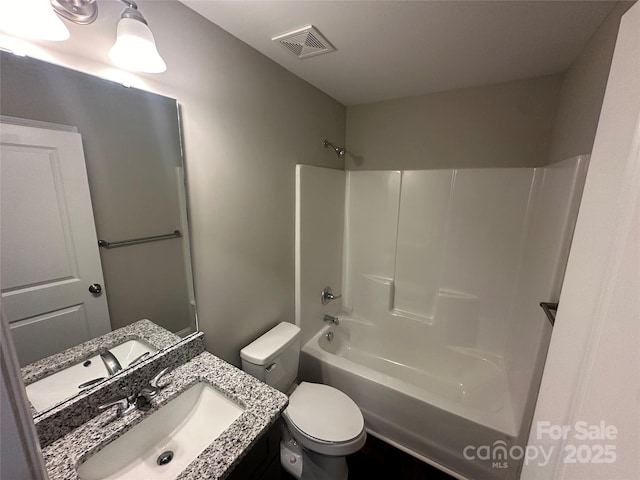 full bathroom with toilet, shower / washtub combination, and vanity