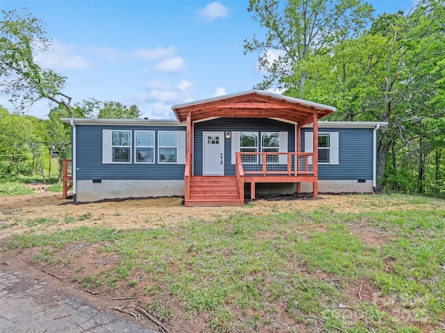 255 Thompson Cove Rd, Clyde, NC 28721 - manufactured / mobile home with crawl space and covered porch