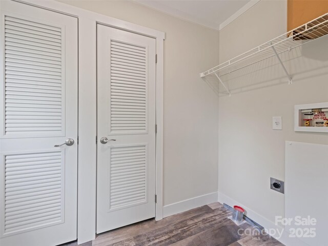 255 Thompson Cove Rd, Clyde, NC 28721 - laundry area featuring hookup for an electric dryer, wood finished floors, baseboards, ornamental molding, and hookup for a washing machine