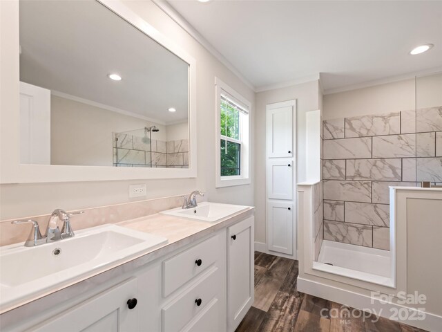 255 Thompson Cove Rd, Clyde, NC 28721 - full bathroom with walk in shower, crown molding, wood finished floors, double vanity, and recessed lighting