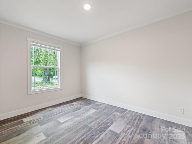 255 Thompson Cove Rd, Clyde, NC 28721 - unfurnished room with baseboards, ornamental molding, wood finished floors, and recessed lighting