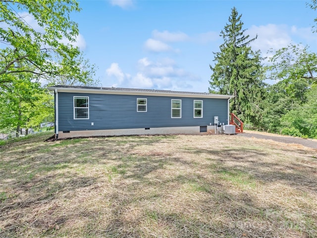 255 Thompson Cove Rd, Clyde, NC 28721 - rear view of property with cooling unit, crawl space, and a yard