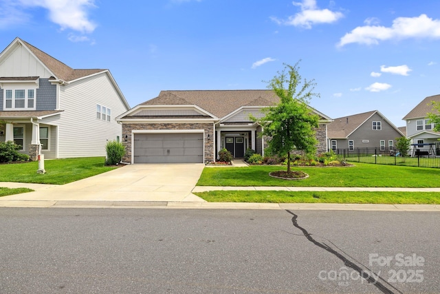 7016 Bareland Rd, Fort Mill, SC 29707 - craftsman house featuring an attached garage, stone siding, concrete driveway, and board and batten siding