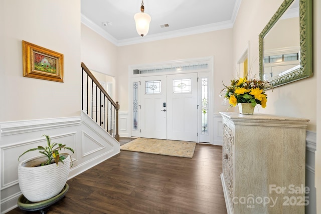 7016 Bareland Rd, Fort Mill, SC 29707 - foyer featuring ornamental molding, stairs, dark wood-style floors, a decorative wall, and wainscoting