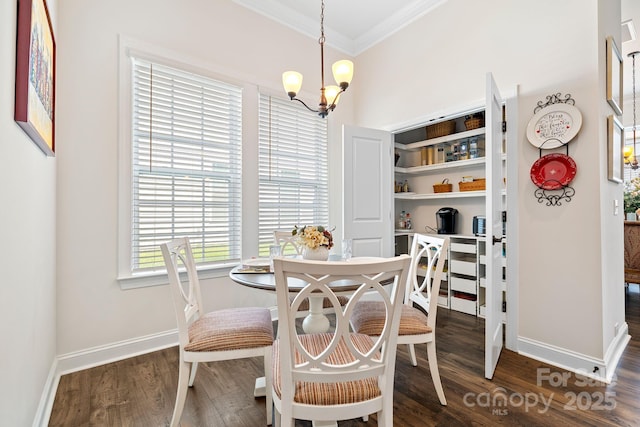 7016 Bareland Rd, Fort Mill, SC 29707 - dining area with crown molding, a chandelier, baseboards, and dark wood-style floors