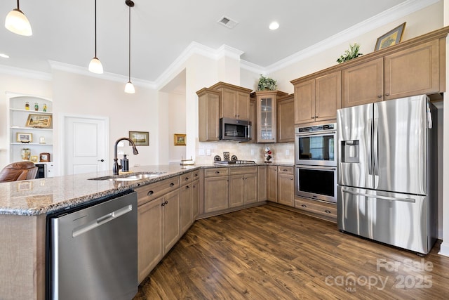 7016 Bareland Rd, Fort Mill, SC 29707 - kitchen with appliances with stainless steel finishes, a sink, a peninsula, light stone counters, and dark wood-style floors