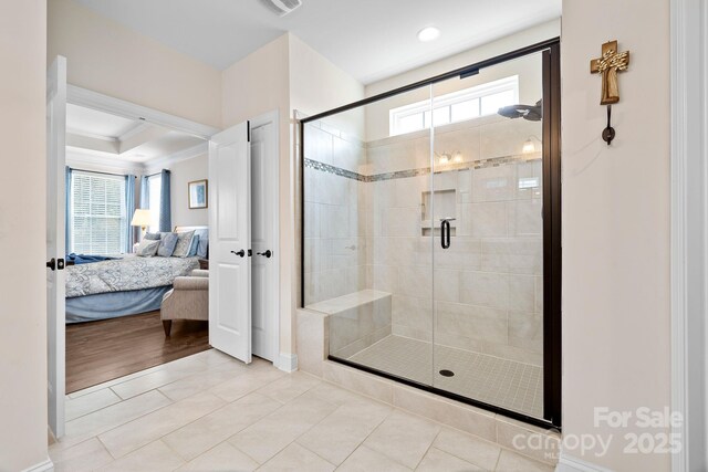 7016 Bareland Rd, Fort Mill, SC 29707 - bathroom featuring connected bathroom, a stall shower, baseboards, ornamental molding, and tile patterned floors