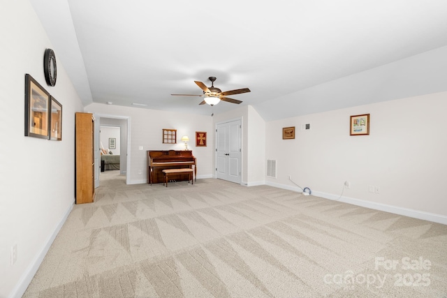 7016 Bareland Rd, Fort Mill, SC 29707 - unfurnished living room with light colored carpet, baseboards, and a ceiling fan