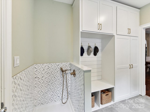 mudroom with wainscoting